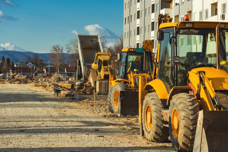 Construction vehicle with loader on building site